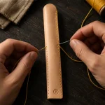 Pen Sleeve Kit, being stitched by hand
