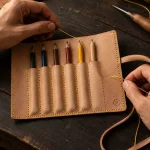 Pencil Roll Kit, being stitched by hand