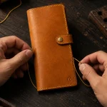 Travel Wallet Kit, being stitched by hand